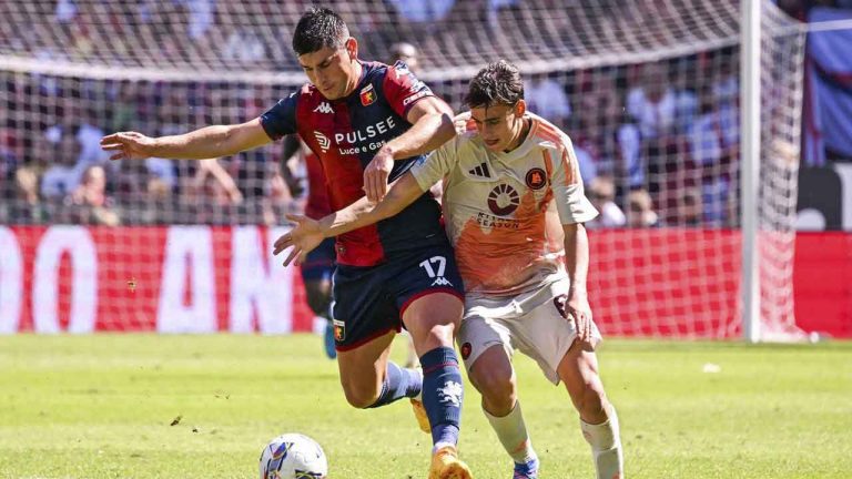 Genoa's Ruslan Malinovskyi and Roma's Niccolo Pisilli, left, in action during the Serie A soccer match between Genoa and Roma at the Luigi Ferraris Stadium in Genoa. (Tano Pecoraro/AP)