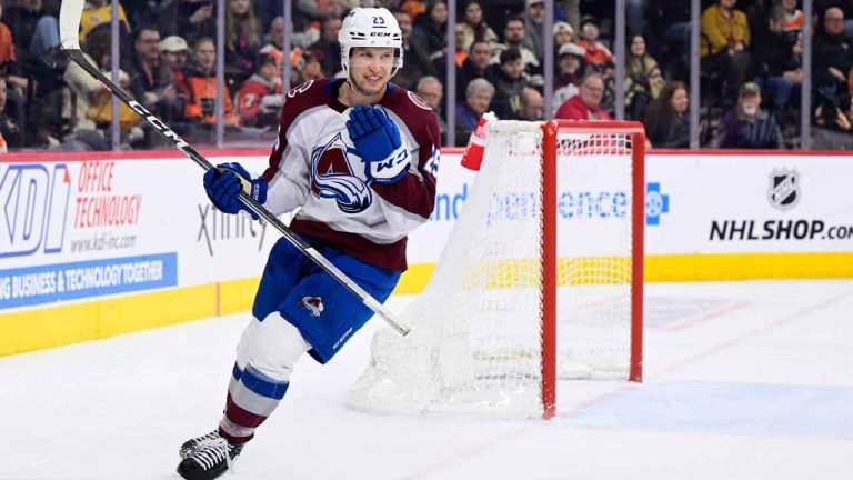 Colorado Avalanche's Logan O'Connor reacts after scoring an empty net goal for a hat trick during the third period of an NHL hockey game against the Philadelphia Flyers. (Derik Hamilton/AP)