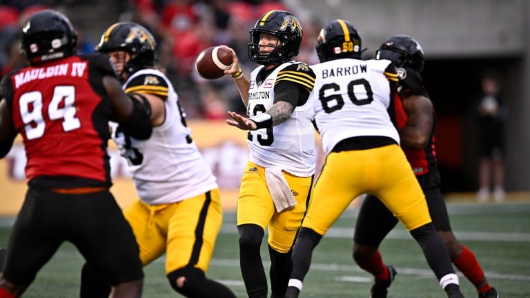 Hamilton Tiger-Cats quarterback Bo Levi Mitchell (19) prepares to throw the ball during first half CFL football action against the Ottawa Redblacks in Ottawa on Sunday, June 30, 2024. (Justin Tang/CP)