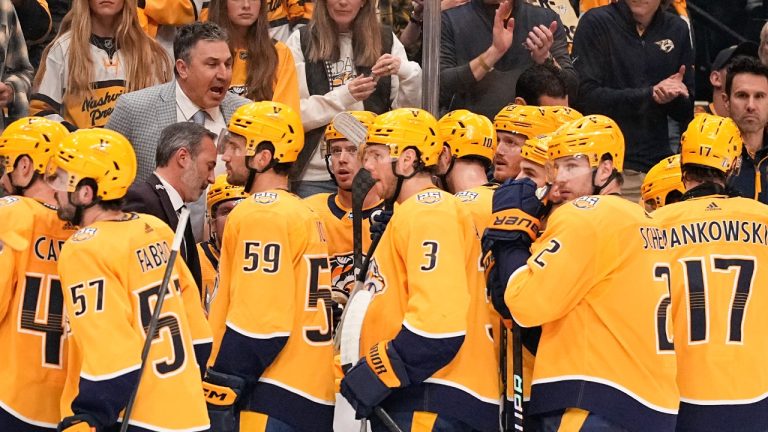 Nashville Predators head coach Andrew Brunette, top left, talks to his players during the third period in Game 4 of an NHL hockey Stanley Cup first-round playoff series against the Vancouver Canucks, Sunday, April 28, 2024, in Nashville, Tenn. (George Walker IV/AP)