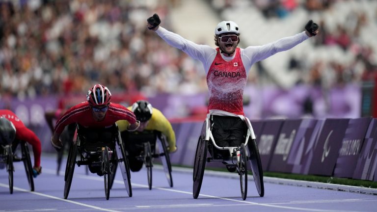 Canada's Austin Smeenk celebrates after winning the men's 800 m. T34 at the 2024 Paralympics, Saturday, Sept. 7, 2024, in Paris, France. (Christophe Ena/AP)