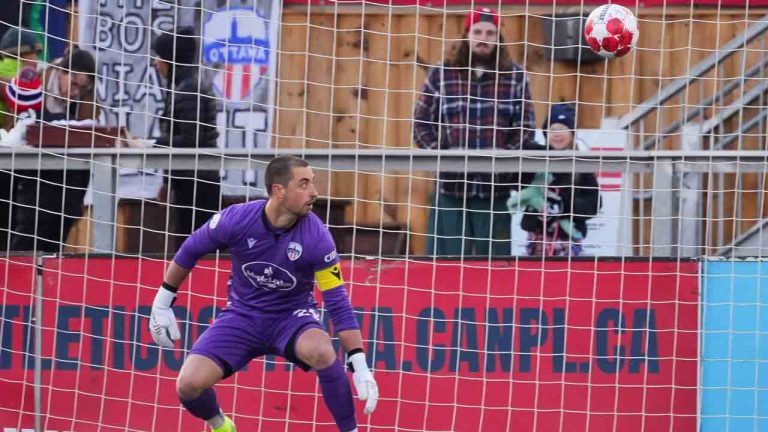 Atletico Ottawa goalkeeper Nate Ingham keeps his eye on the ball in the Canadian Premier League playoff quarterfinal with York United FC at TD Place in Ottawa on Sunday, Oct. 27, 2024. Ottawa won in a penalty shootout. THE CANADIAN PRESS/HO-Canadian Premier League-Freestyle Photography-Matt Zambonin