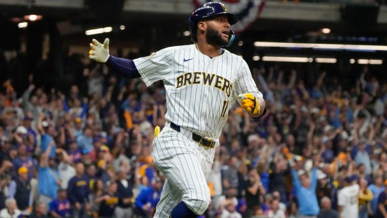 Milwaukee Brewers' Jackson Chourio reacts after hitting a home run during the eighth inning of Game 2 of a National League wild card baseball game against the New York Mets Wednesday, Oct. 2, 2024, in Milwaukee. (Morry Gash/AP)