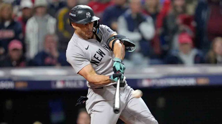 New York Yankees' Giancarlo Stanton hits a two-run home run against the Cleveland Guardians during the sixth inning in Game 5 of the baseball AL Championship Series Saturday, Oct. 19, 2024, in Cleveland. (Godofredo A. Vásquez/AP)