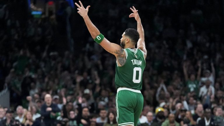 Boston Celtics forward Jayson Tatum (0) celebrates after a 3-pointer during the second half of an NBA basketball game against the New York Knicks, Tuesday, Oct. 22, 2024, in Boston. (Charles Krupa/AP Photo)
