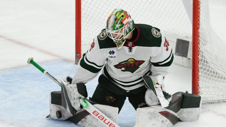 Minnesota Wild goalie Jesper Wallstedt (30) makes a save during the second period of an NHL hockey game against the Chicago Blackhawks Sunday, April 7, 2024, in Chicago. (Paul Beaty/AP Photo)