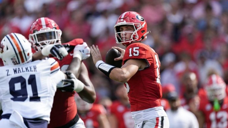 Georgia quarterback Carson Beck (15) throws from the pocket in the first half of an NCAA college football game against Auburn Saturday, Oct. 5, 2024, in Athens, Ga. (John Bazemore/AP Photo)

