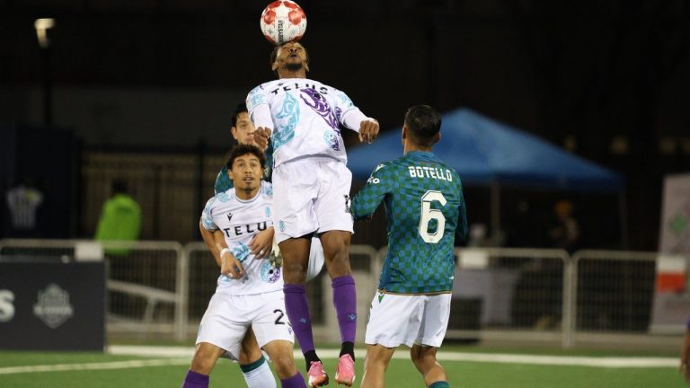 York United FC's Orlando Botello, right, watches as a Pacific FC player goes after the ball in the fourth- versus fifth-place Canadian Premier League playoff game in Toronto in this Wednesday, October 23, 2024 handout photo. (THE CANADIAN PRESS/HO, Denys Rudenko, York United, CPL)
