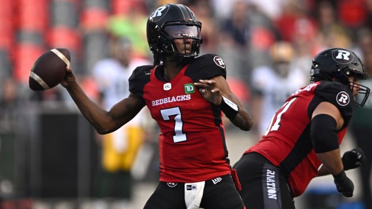 Ottawa Redblacks quarterback Tyrie Adams (7) throws the ball during first half CFL football action against the Edmonton Elks in Ottawa on Friday, June 30, 2023. The Redblacks signed American quarterback Adams to a one-year contract extension Wednesday. (Justin Tang/CP)