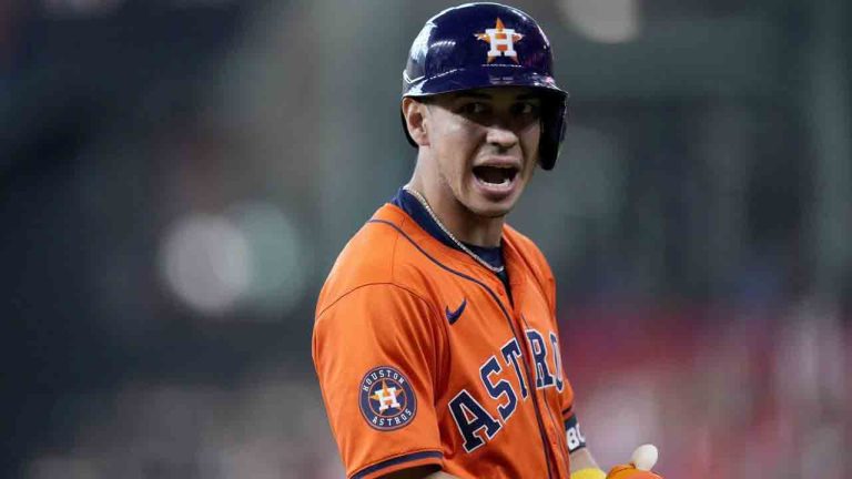 Houston Astros' Mauricio Dubon celebrates his bunt for a single against the Detroit Tigers in the seventh inning of Game 2 of an AL Wild Card Series baseball game Wednesday, Oct. 2, 2024, in Houston. (Kevin M. Cox/AP)