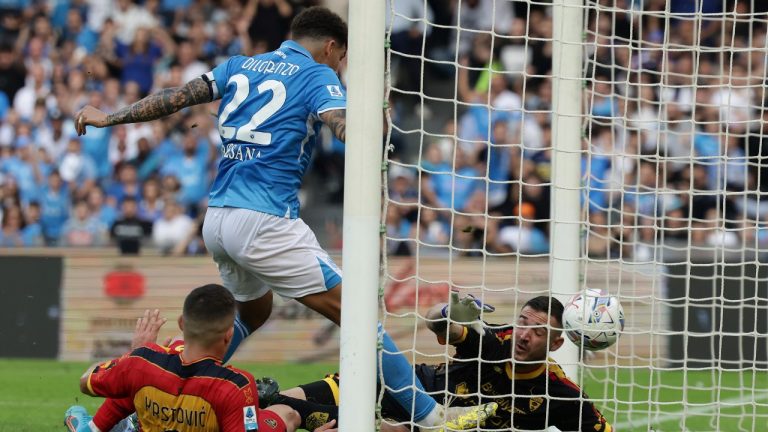 Napoli's Giovanni Di Lorenzo, centre, scores the opening goal during the Serie A soccer match between Napoli and Lecce at the Diego Armando Maradona Stadium in Naples, Italy, Saturday, Oct. 26, 2024. (Alessandro Garofalo/LaPresse via AP)