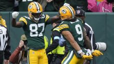 Doubs scores two touchdowns in return from suspension as Packers rout Cardinals