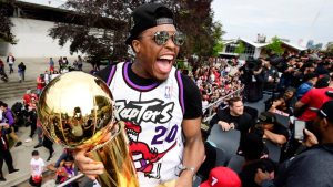 Toronto Raptors guard Kyle Lowry celerates during the 2019 Toronto Raptors Championship parade in Toronto on Monday, June 17, 2019. (Frank Gunn/CP)