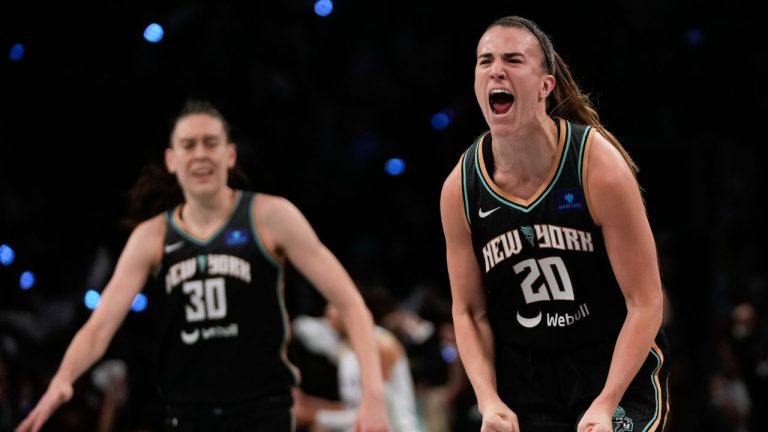 New York Liberty guard Sabrina Ionescu (20) reacts after scoring against the Minnesota Lynx during the third quarter of Game 5 of the WNBA basketball final series, Sunday, Oct. 20, 2024, in New York. (Pamela Smith/AP Photo)