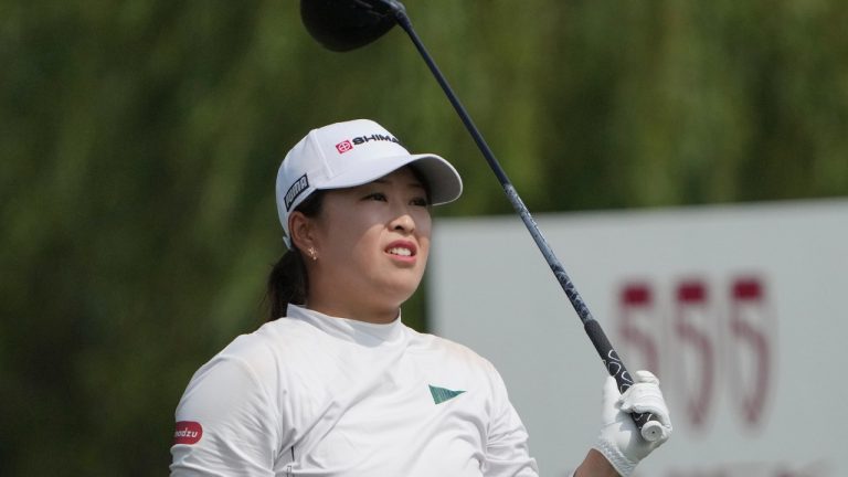 Mao Saigo of Japan watches her tee shot on the 4rd hole during the third round of the LPGA Shanghai at Shanghai Qizhong Garden Golf Club in Shanghai, China, Saturday, Oct. 12, 2024. (Achmad Ibrahim/AP)