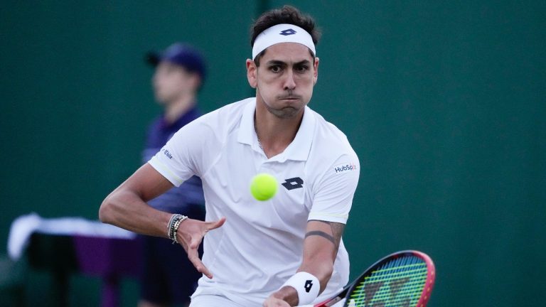 Alejandro Tabilo of Chile plays a forehand return to Taylor Fritz of the United States during their third round match at the Wimbledon tennis championships in London, Saturday, July 6, 2024. (Mosa'ab Elshamy/AP Photo)