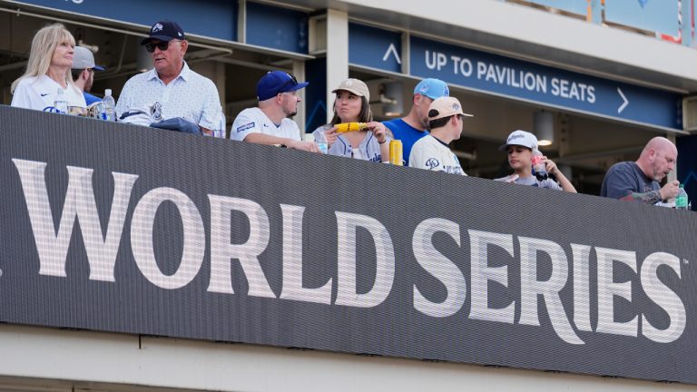 Fan attend Game 2 of the baseball World Series at Dodger Stadium, Saturday, Oct. 26, 2024, in Los Angeles. (Julio Cortez/AP)