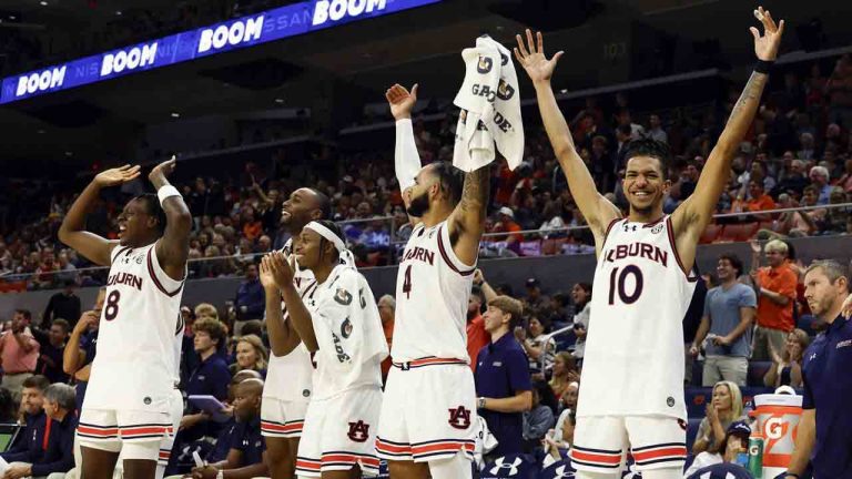 Auburn guard Chad Baker-Mazara (10) and teammates react after a slam dunk by forward Jahki Howard during the second half of an NCAA college basketball game against Vermont, Wednesday, Nov. 6, 2024, in Auburn, Ala. (Butch Dill/AP)
