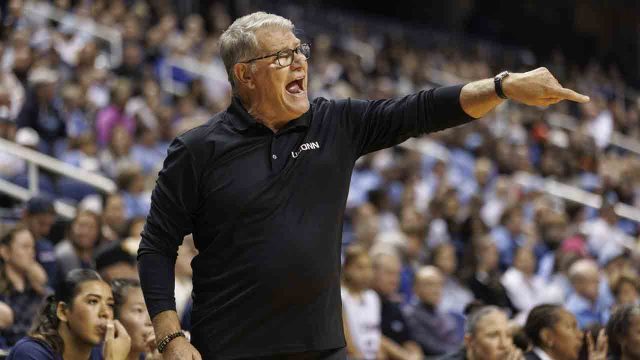 Geno Auriemma, UConn's Champion Coach, Flexes With Ring Photo