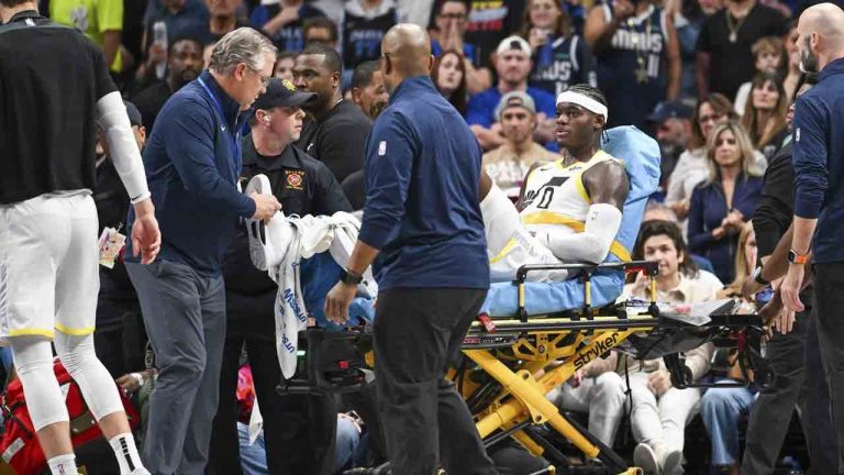 Utah Jazz forward Taylor Hendricks (0) is wheeled off by paramedics after sustaining an injury in the second half during an NBA basketball game against the Dallas Mavericks, Monday, Oct. 28, 2024, in Dallas. (Albert Pena/AP)