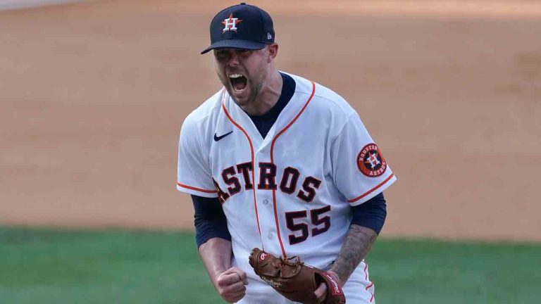 Houston Astros pitcher Ryan Pressly (55) reacts after striking out Oakland Athletics' Khris Davis for the final out of the ninth inning of Game 4 of a baseball American League Division Series in Los Angeles, Thursday, Oct. 8, 2020. The Astros defeated the Athletics, 11-6, to win the series. (Ashley Landis/AP)