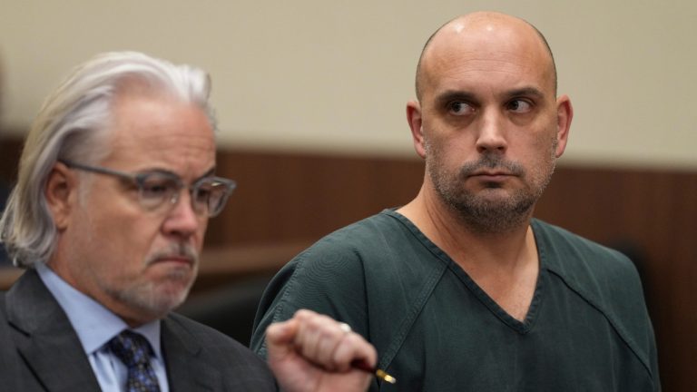 Sean M. Higgins, right, the driver charged with killing NHL hockey player Johnny Gaudreau and his brother Matthew as they bicycled on a rural road, appears at the Salem County, N.J., Courthouse with his lawyer Matthew Portella, Tuesday, Nov. 12, 2024, in Salem, N.J. (Matt Slocum/AP)