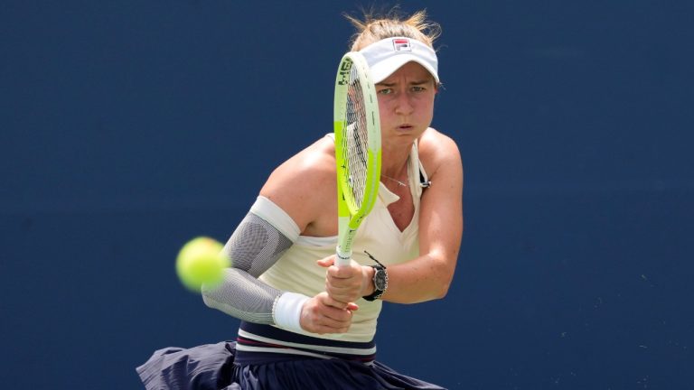 Barbora Krejcikova, of the Czech Republic, returns a shot. (Kirsty Wigglesworth/AP)