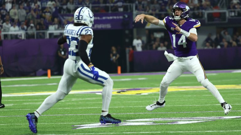 Minnesota Vikings quarterback Sam Darnold (14) throws a pass over Indianapolis Colts cornerback Samuel Womack III (33) during the first half of an NFL football game, Sunday, Nov. 3, 2024, in Minneapolis. (Ellen Schmidt/AP)