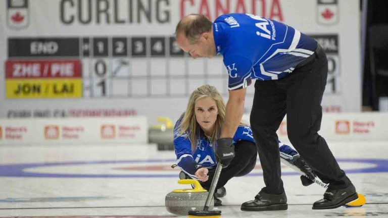 Jennifer Jones and Brent Laing are shown in action against Jessica Zheng and Victor Pietrangelo during the Canadian mixed doubles curling trials in Liverpool, N.S. on Monday, Dec.30, 2024. THE CANADIAN PRESS/HO-Michael Burns