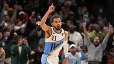 Young hits winning 3-pointer in OT to help Hawks overcome Lakers, James’ triple-double