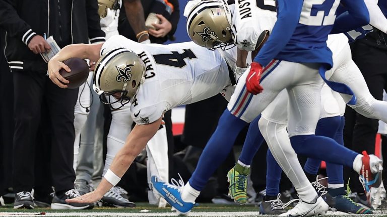 New Orleans Saints quarterback Derek Carr comes down on his arm as he is tackled by the New York Giants during the fourth quarter of an NFL game, Sunday, Dec. 8, 2024, in East Rutherford, N.J. (AP/Adam Hunger)