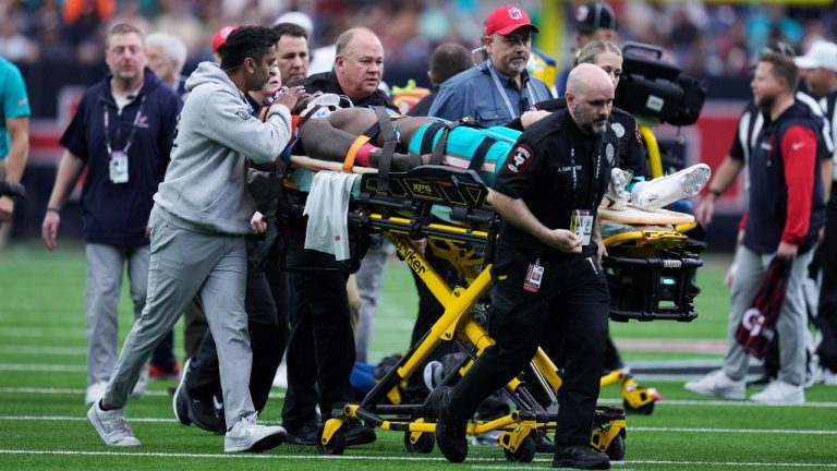 Miami Dolphins wide receiver Grant DuBose (88) is carted off the field after being injured during the second half of an NFL football game against the Houston Texans. (Eric Christian Smith/AP)