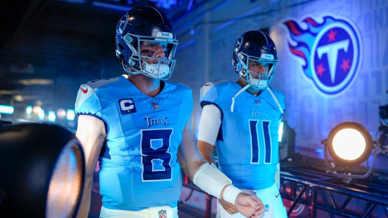 Tennessee Titans' Will Levis (8) and Mason Rudolph (11) take the field before an NFL football game against the Green Bay Packers. (George Walker IV/AP)