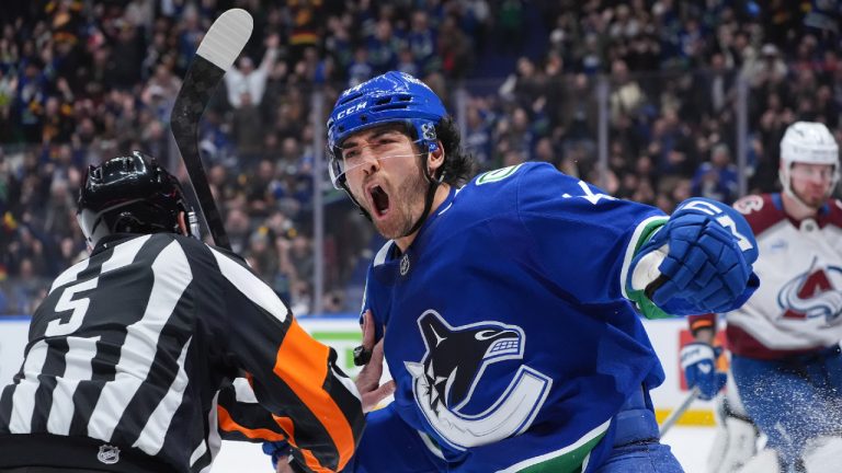 Kiefer Sherwoods Hat Trick Powers Canucks to Victory Over Avalanche