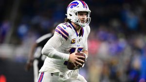 Buffalo Bills quarterback Josh Allen looks to pass during the second half of an NFL football game against the Detroit Lions in Detroit, Sunday, Dec. 15, 2024. The Bills won 48-42. (David Dermer/AP)