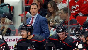 Carolina Hurricanes head coach Rod Brind'Amour watches from the sideline during the second period of an NHL hockey game against the Ottawa Senators in Raleigh, N.C., Friday, Dec. 13, 2024. (Karl B DeBlaker/AP)