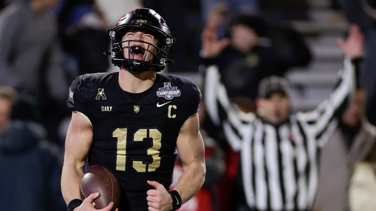 Army quarterback Bryson Daily (13) reacts after scoring a touchdown against Tulane during the first quarter of an NCAA college football game, Friday, Dec. 6, 2024, in West Point, N.Y. (Adam Hunger/AP Photo)