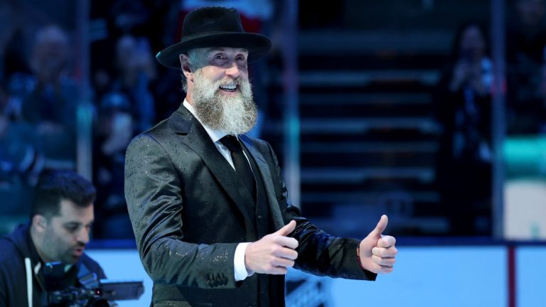 Joe Thornton gives thumbs up during a ceremony to retire his jersey before an NHL Hockey game between the San Jose Sharks and the Buffalo Sabres Saturday, Nov. 23, 2024 in San Jose, California. (Ezra Shaw/ Pool Photo via AP)