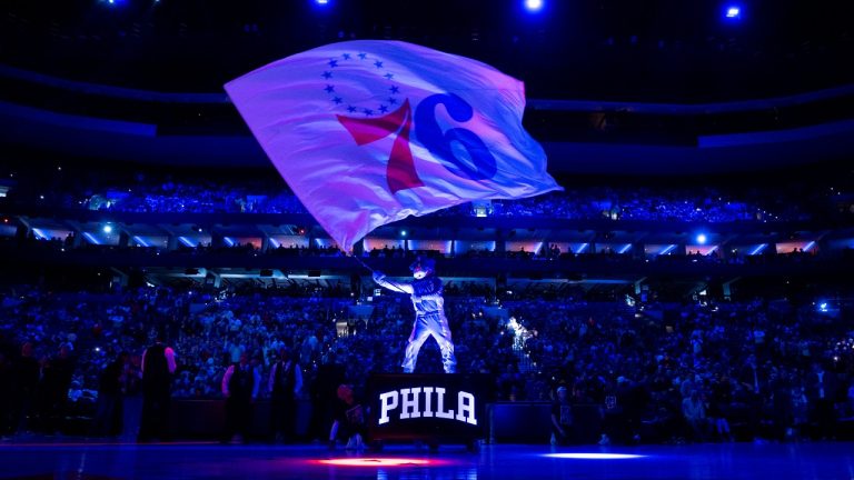 Philadelphia 76ers mascot Franklin waves the flag during pre-game introductions prior to the NBA basketball game against the Brooklyn Nets, Sunday, April 14, 2024, in Philadelphia. The 76ers won 107-86. (AP Photo/Chris Szagola)