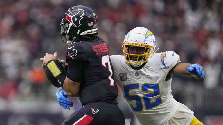 Houston Texans quarterback C.J. Stroud (7) is sacked by Los Angeles Chargers' Khalil Mack (52) during the first half of an NFL wild-card playoff football game Saturday, Jan. 11, 2025, in Houston. (Ashely Landis/AP)