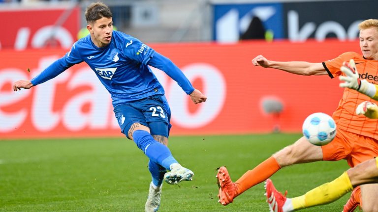 Hoffenheim's Adam Hlozek scores the goal that was later disallowed during the German Bundesliga soccer match between TSG 1899 Hoffenheim and Eintracht Frankfurt at the PreZero Arena in Sinsheim, Germany, Sunday Jan. 26, 2025. (Uwe Anspach/dpa via AP)