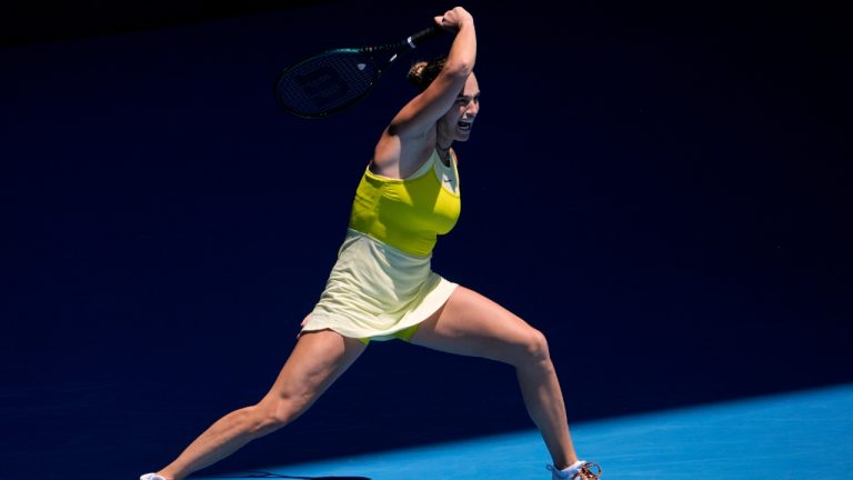 Aryna Sabalenka of Belarus plays a forehand return to Clara Tauson of Denmark during their third round match at the Australian Open tennis championship in Melbourne, Australia, Friday, Jan. 17, 2025. (Asanka Brendon Ratnayake/AP)