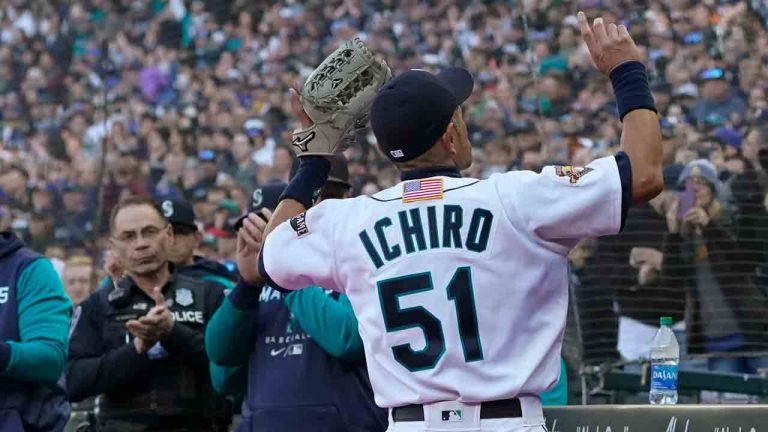 Former Seattle Mariners outfielder Ichiro Suzuki is introduced before he threw out the first pitch before the team's baseball game against the Houston Astros, Friday, April 15, 2022, in Seattle. (Ted S. Warren/AP)