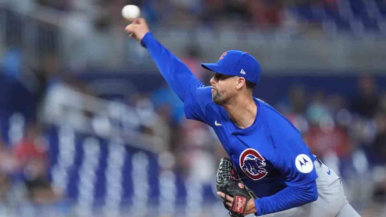 Chicago Cubs' Jorge López delivers a pitch during the ninth inning of a baseball game against the Miami Marlins, Friday, Aug. 23, 2024, in Miami. (Wilfredo Lee/AP)