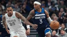 Timberwolves’ McDaniels, sprained wrist, misses first game in two years
