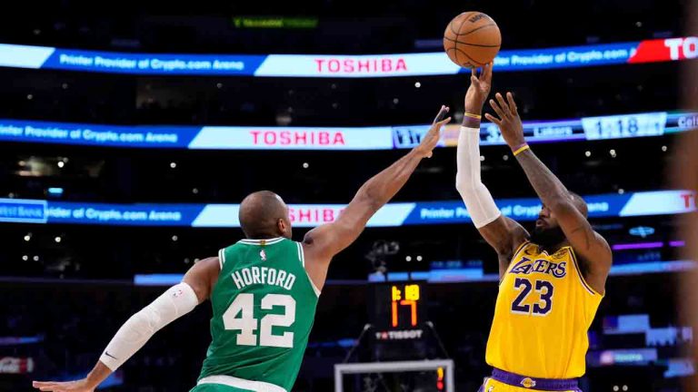 Los Angeles Lakers forward LeBron James, right, shoots as Boston Celtics centre Al Horford defends during the first half of an NBA basketball game, Thursday, Jan. 23, 2025, in Los Angeles. (Mark J. Terrill/AP)