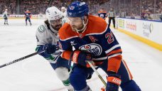 Hyman, Draisaitl lead Oilers to victory over Canucks