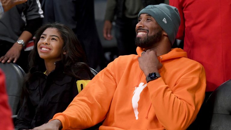 Former Los Angeles Laker Kobe Bryant and his daughter Gianna Bryant attend an NBA basketball game between the Los Angeles Lakers and Dallas Mavericks Sunday, Dec. 29, 2019, in Los Angeles. (Michael Owen Baker/AP)