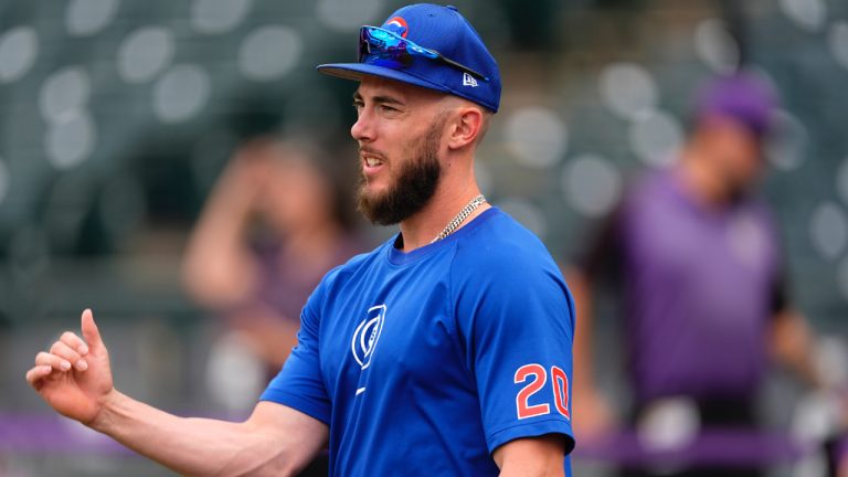 Miles Mastrobuoni (20) warms up before a baseball game Friday, Sept. 13, 2024, in Denver. (David Zalubowski/AP)