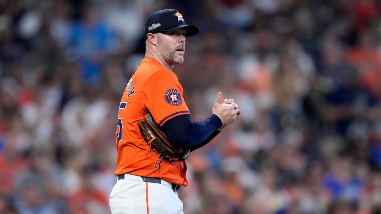 Houston Astros relief pitcher Ryan Pressly walks back onto the mound after throwing a wild pitch that allowed Detroit Tigers' Kerry Carpenter to score in the eighth inning of Game 2 of an AL Wild Card Series baseball game Wednesday, Oct. 2, 2024, in Houston. (Kevin M. Cox/AP)
